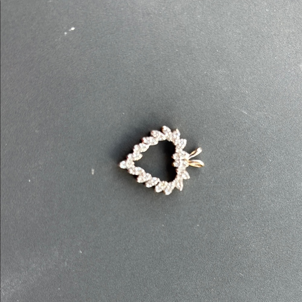 Elegant Gold and Silver Heart Pendant